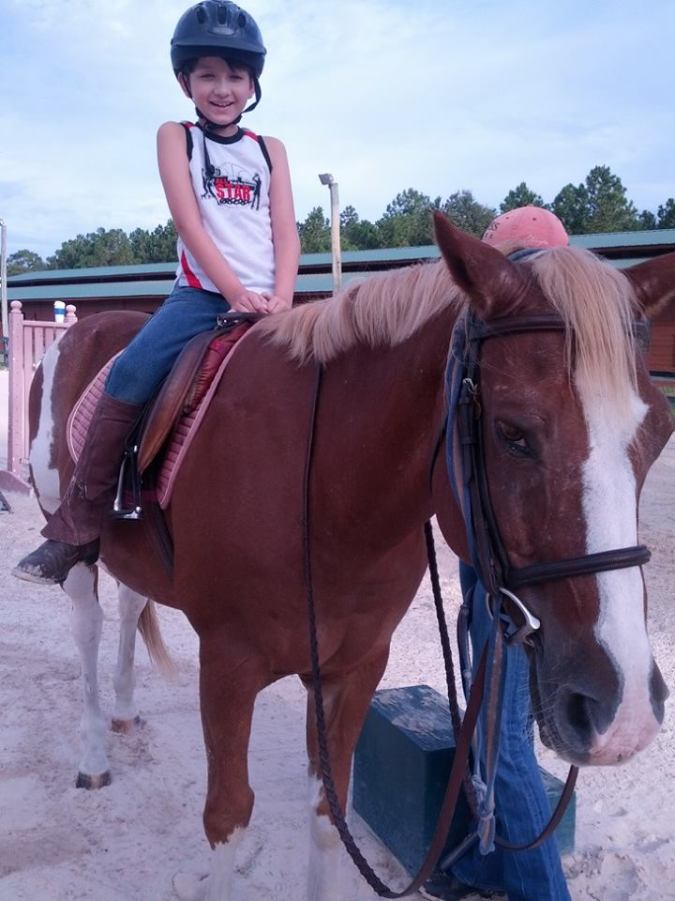 He doesn't actively ride anymore, but is considering getting back into it once it cools off again, but here is my son riding Sox.  